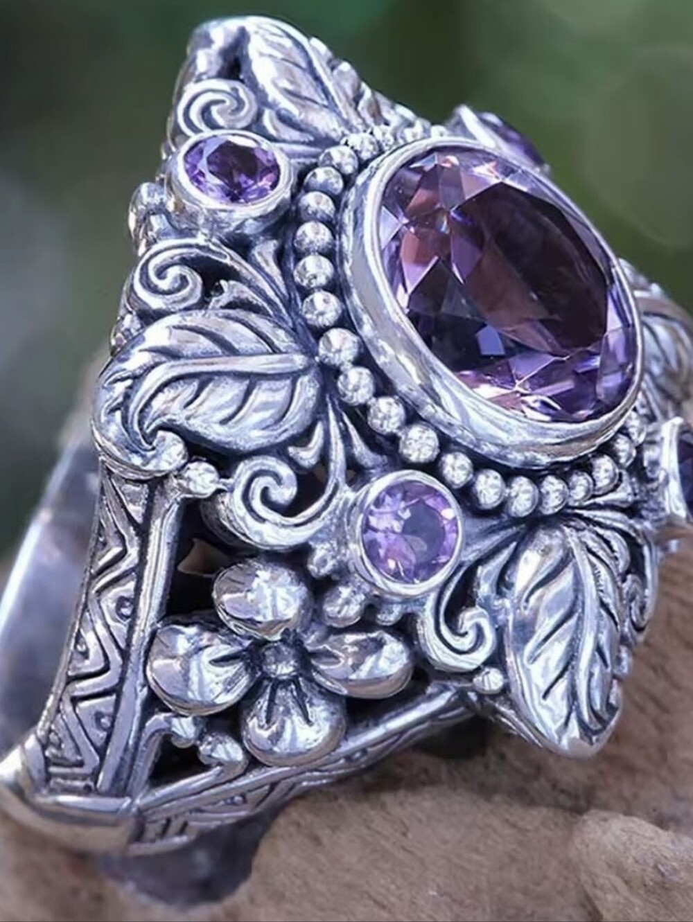 Silver Ornate Ring with Purple Gemstone